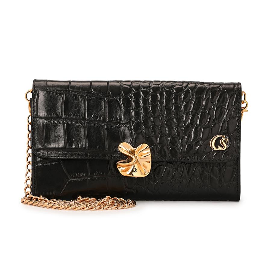 CLUTCH WITH ORGANIC EMBELLISHMENT